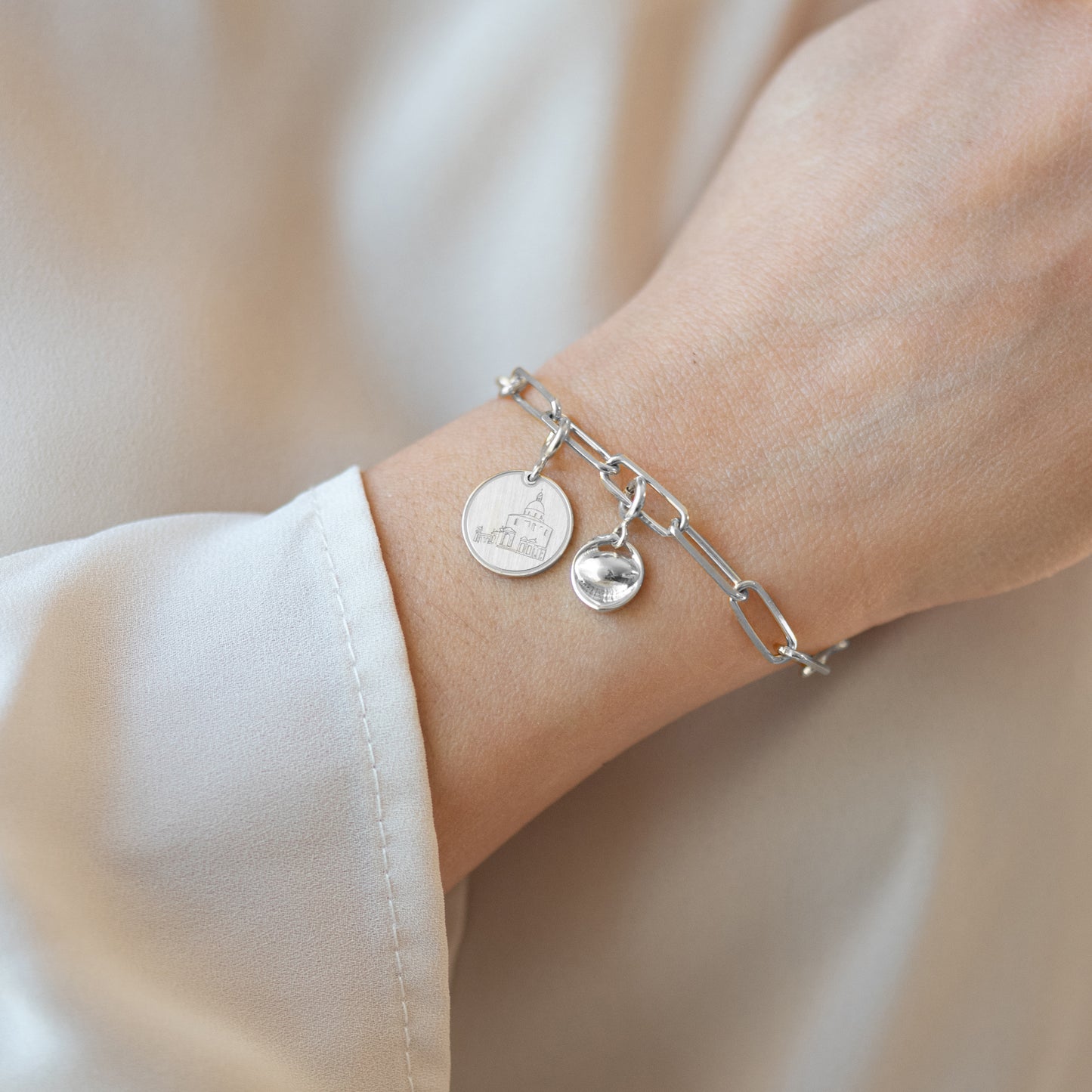 Charm San Luca Argento