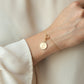 Bracciale a cerchio con charm rinasci oro