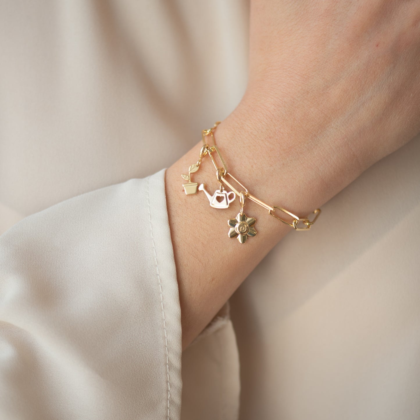 Charm Rinasci Placcato Oro