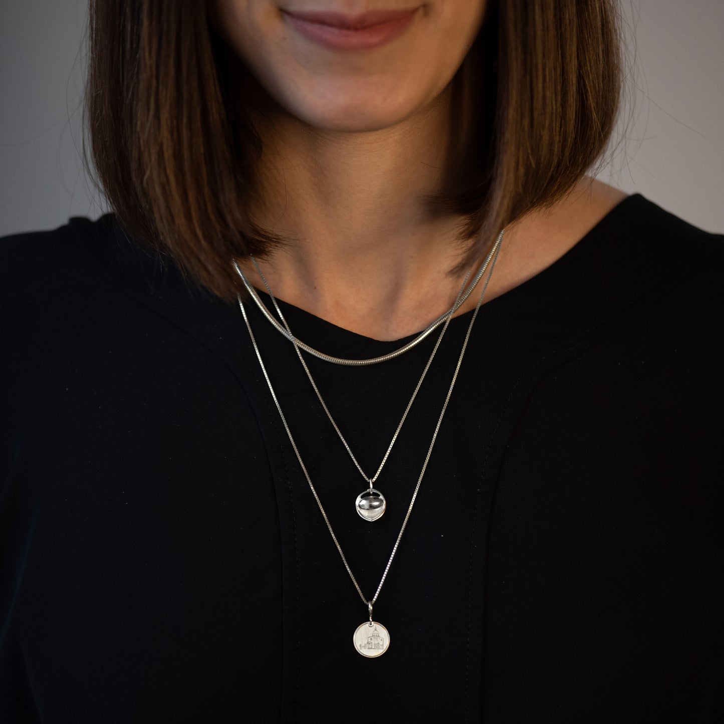 Charm San Luca Argento